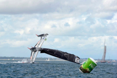 Spindrift winner of the Lisbon to Dun Laoghaire leg crashes out of the La Route des Princes in Dublin bay in style as she capsizes ! © Michael Chester