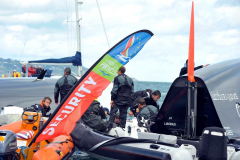 Spindrift winner of the Lisbon to Dun Laoghaire leg crashes out of the La Route des Princes in Dublin bay in style as she capsizes ! members of the crew attend to the injured as reccue boats attend © Michael Chester